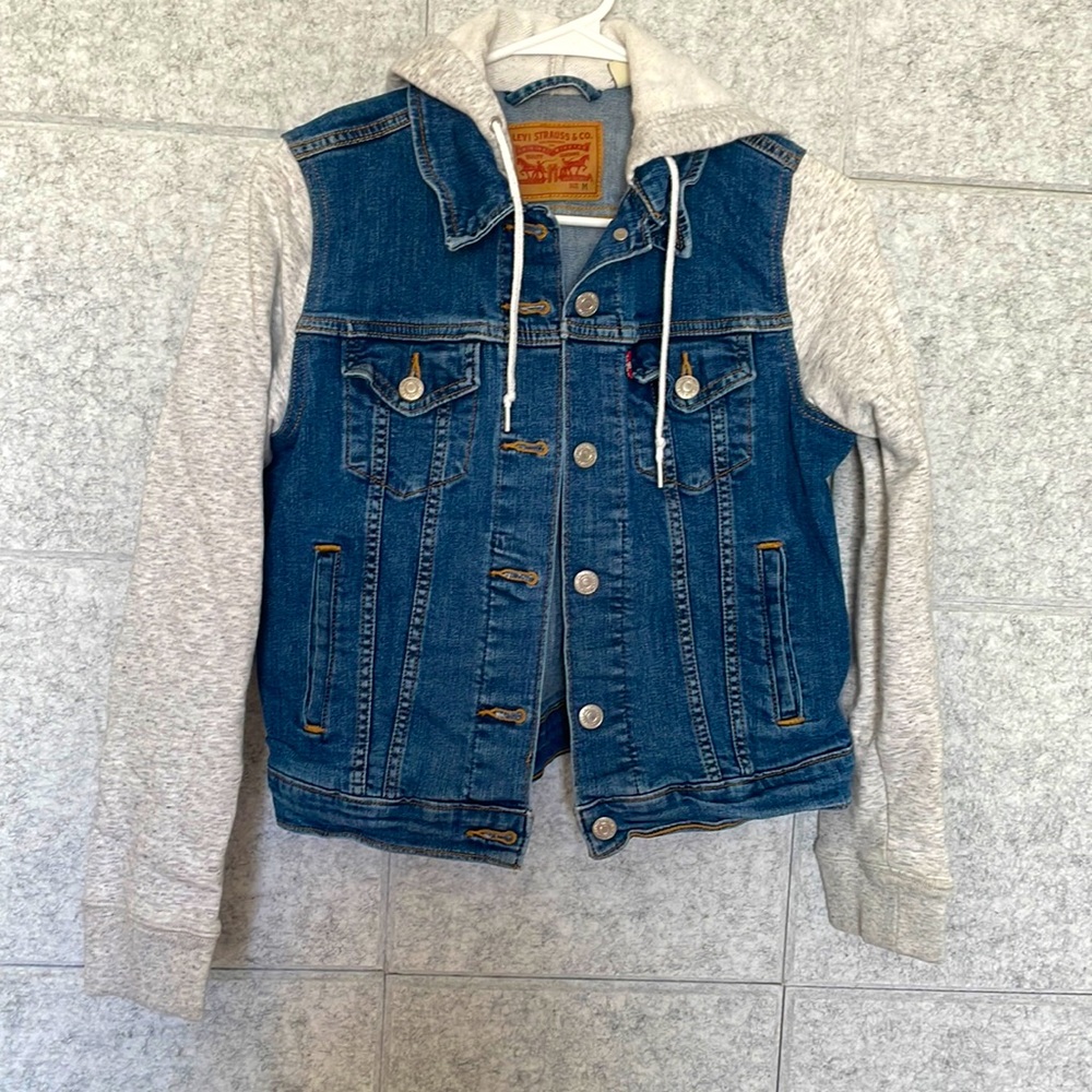 Levis Jean jackets. Sleeves are sweater material.